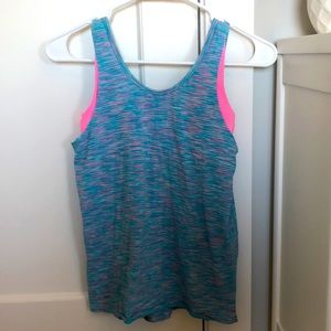 This is an ivivva athletic tank top with a built-in sports bra.